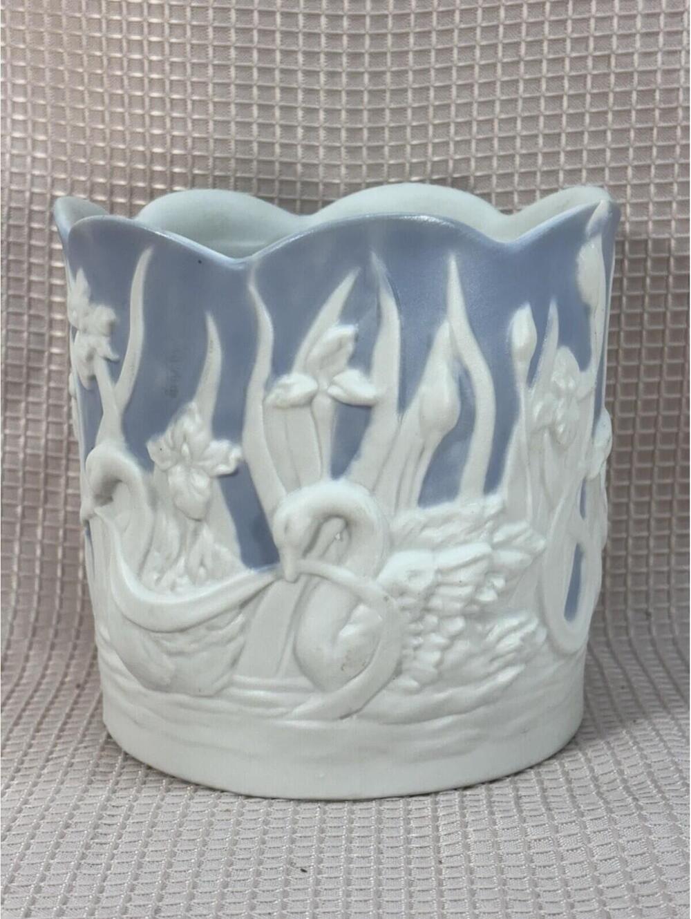 209 - Bisque Porcelain Planter Raised White Swans Blue Background (wedgewoodish)